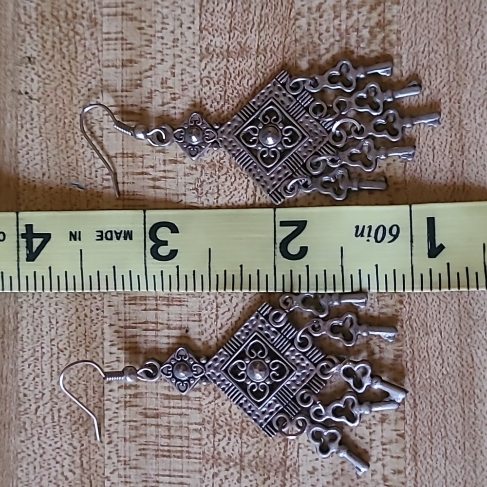 Silver color key earrings